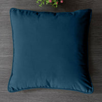 Soft decorative pillow covers in a living room setting.