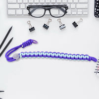 Multicolor adjustable phone wrist strap lanyard displayed on a clean surface.