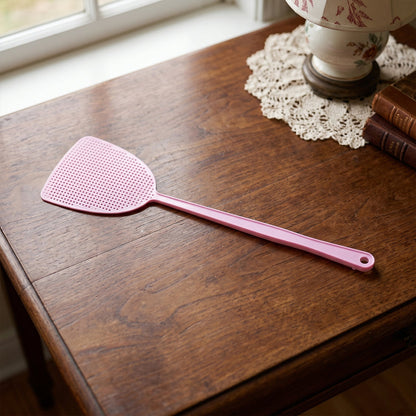 Long handle pest swatter for home or outdoor use