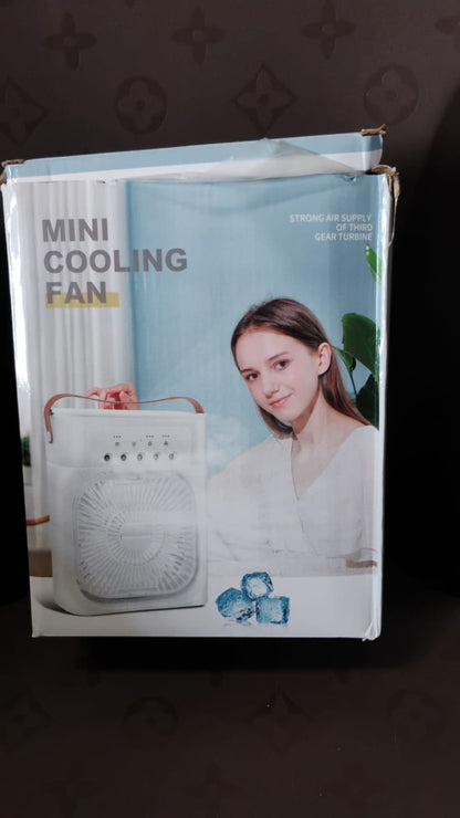 In-use lifestyle shot of portable air cooler fan with LED light