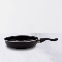 14-inch hard anodized tadka fry pan with induction base on a white surface.