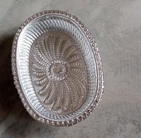 Multipurpose royal design oval silver gift tray for dry fruits.