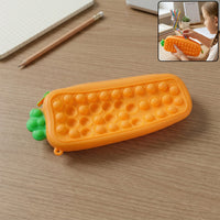 Carrot-shaped Pop It silicone pencil pouch with textured bubbles