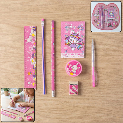 Pink 7-in-1 children’s stationery components with playful designs
