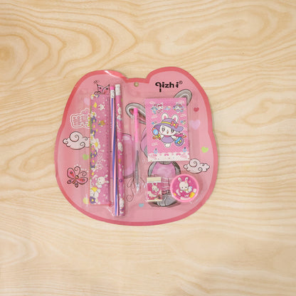 Pink kids stationery set displayed with all included items