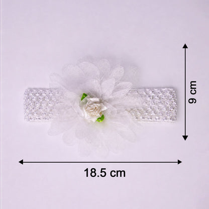 Close-up of colorful floral baby headband made from elastic fabric