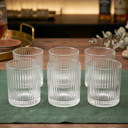 Complete set of six stylish crystal glass tumblers for serving