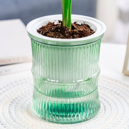 Side view of bamboo-style self-watering planter pot