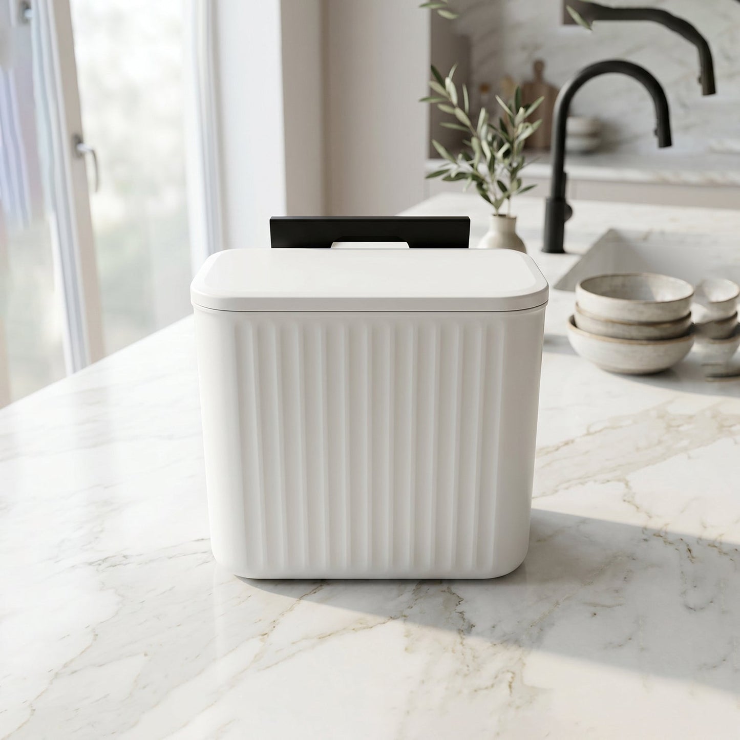 Side view of small kitchen waste bin