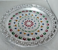 Elegant silver plated pooja thali, perfect for Indian traditional worship and ceremonies.